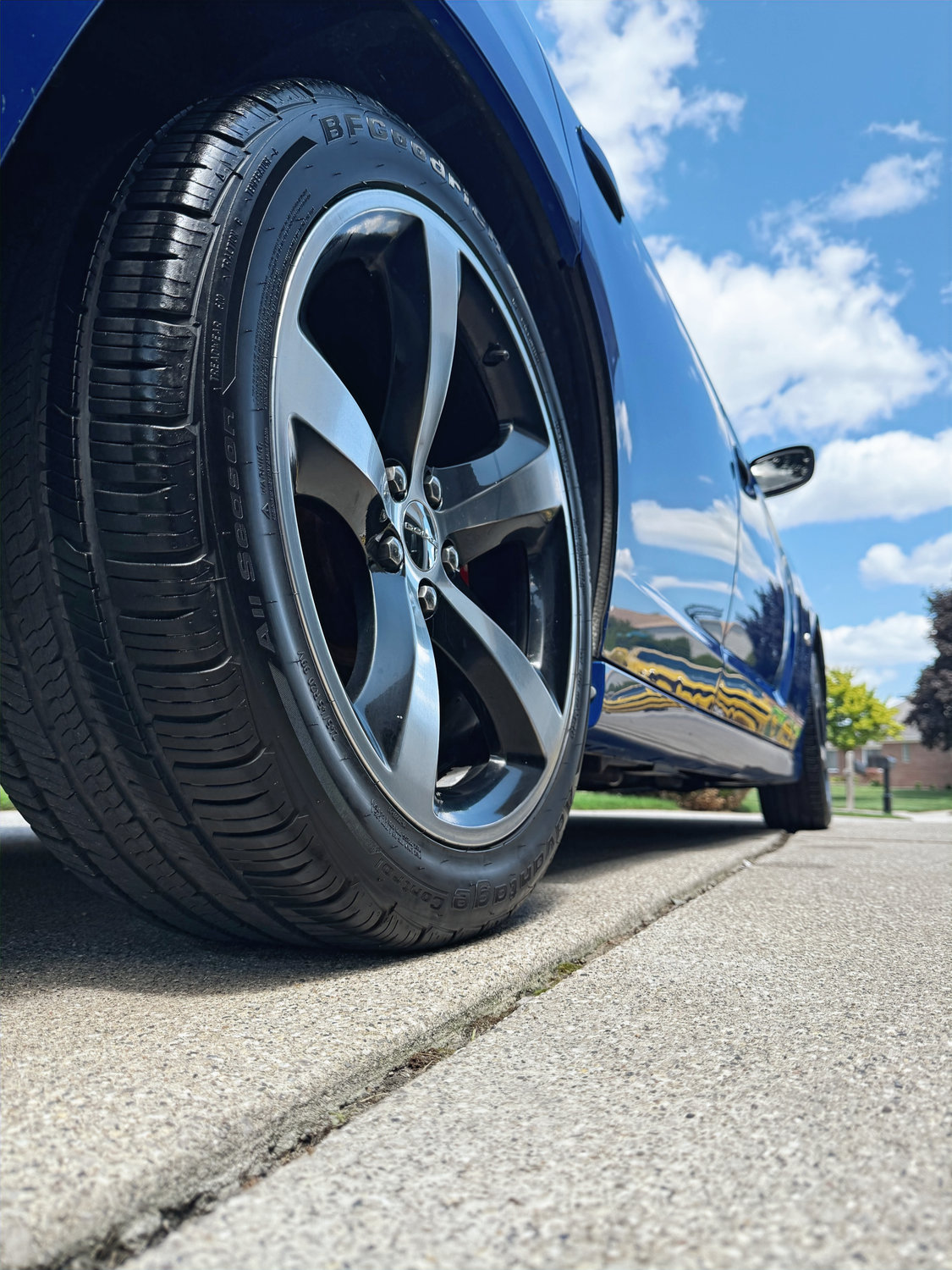 Freshly detailed wheel and glossy paintwork by A&F Auto Detailing